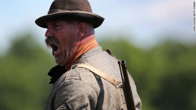 A Confederate soldier yells orders during a reenactment in Gettysburg on June 29.