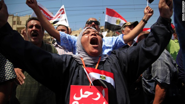 Morsy opponents protest outside the presidential palace in Cairo on June 30.