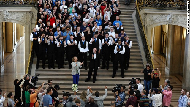 A chorus sings for newlyweds at City Hall in San Francisco on June 28.