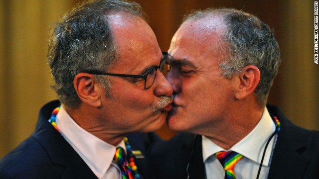 Jeff Foote, left, and Cosgrove Norstadt kiss during their wedding on San Francisco on June 28.