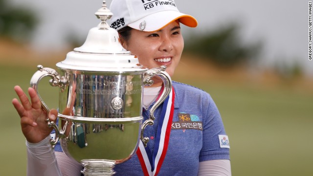 Inbee Park holds the U.S. Women's Open trophy aloft after her four-shot victory.