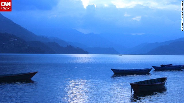 <a href='http://ireport.cnn.com/docs/DOC-991303 '>Srijan Shrestha</a> says Fewa Lake is a busy tourist attraction, so "I was fortunate to take a picture of the empty boats laying at at the lake on such a soothing calm evening."