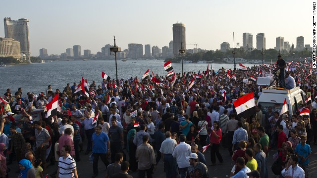 Opponents of Morsy march on the Qasr el-Nil bridge leading to Tahrir Square.