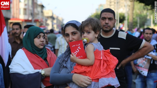 <a href='http://ireport.cnn.com/docs/DOC-998115'>iReporter and photographer Hasan Amin </a>captured images of the crowd of protesters marching against President Mohamed Morsy in Cairo, Egypt. "It was positive, a lot of Egyptians went to protest for the first time," he said. "They have faith that they can change [things] and that their fate is in their hands." 