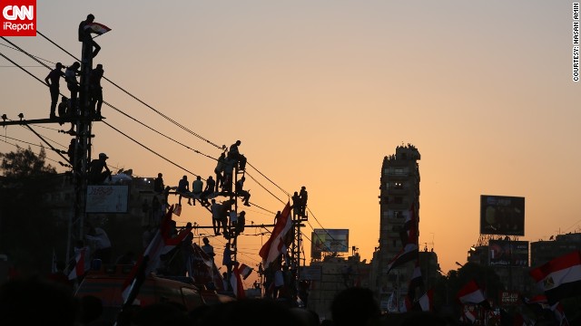 The crowds, Hasan Amin said, were huge, and gathered all around the city's presidential palace, metro stations and streets. "They all were united on one demand -- Morsy to step down," he said. Please be warned one of these images contains a swear word. 