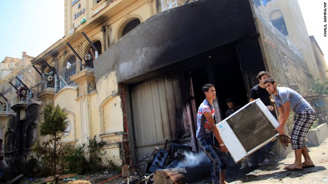 Egyptian protesters ransack the Muslim Brotherhood headquarters in Cairo on July 1.