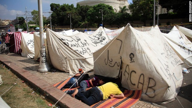 Opponents of Morsy camp out as they protest outside the presidential palace in Cairo on July 2.
