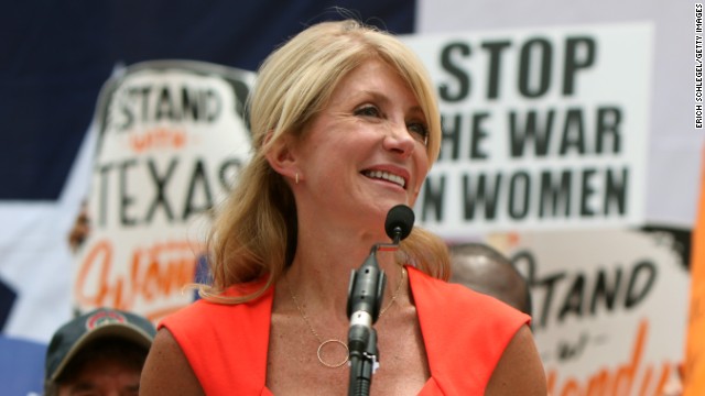 Davis leads a rally in support of women's rights to reproductive decisions on July 1.