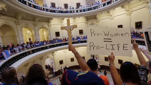 Supporters on both sides of the issue crowd into the rotunda of the Texas Capitol on July 1.