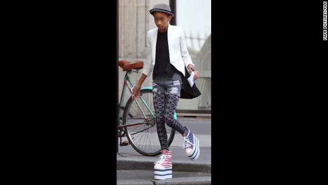 Willow Smith keeps her balance atop a serious pair of Americana-inspired platforms while in France in May 2012.