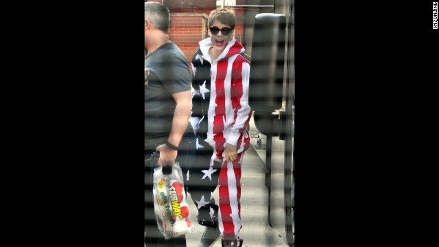 Justin Bieber may be Canadian, but this technicality didn't stop the teen idol from appearing from head to toe in an American flag-style outfit in Nottingham, England, in March 2011.