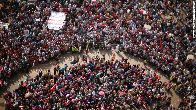 Protesters at Tahrir Square in Cairo on July 1 demand that Morsy resign. The U.S. Embassy in Cairo, which has been closed since June 30, will remain closed on Wednesday.