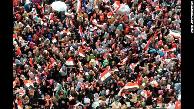 A sea of protesters opposing Morsy waves flags in Tahrir Square on Sunday, June 30. The Obama administration has urged Morsy to call early elections