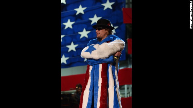 Kid Rock doesn't break a sweat in a star-spangled fur coat at Ramstein Air Base in Germany in 2001.