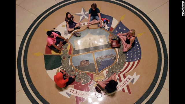 Opponents of an abortion bill chant outside the hearing for the bill on July 2.