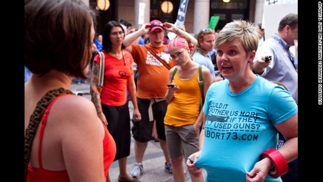 Anti-abortion activist Pamela Whitehead of Katy, Texas, argues with an abortion rights activist on July 2.