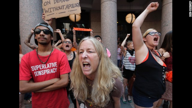 Opponents of an abortion bill yell chants outside a hearing about the bill on July 2. 