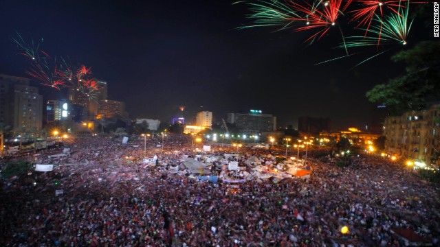 Fireworks light the sky as Morsy opponents celebrate in Tahrir Square on July 3.