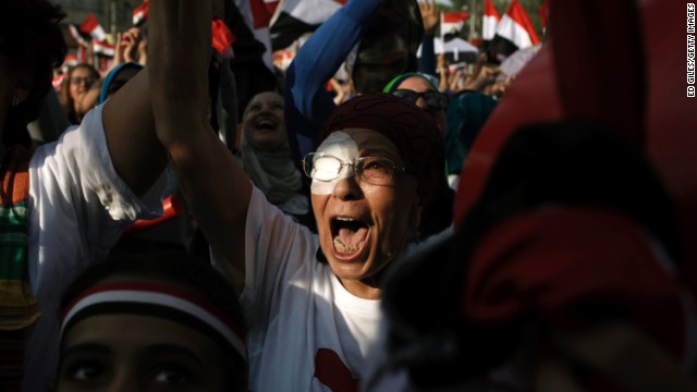 Opposition protesters celebrate outside Egypt's Presidential Palace in Cairo on July 3.