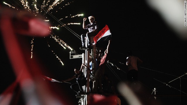 Protesters celebrate outside Egypt's Presidential Palace in Cairo on Wednesday, July 3.