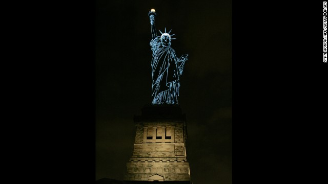 During a special 2006 show by French champagne maker Moët &amp; Chandon, the Statue of Liberty is lit to show the contours of the sculpture.