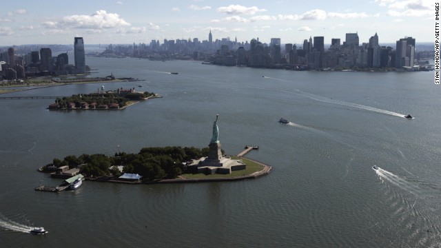 An aerial view of New York Harbor shows Lady Liberty, Ellis Island and Manhattan in 2007.