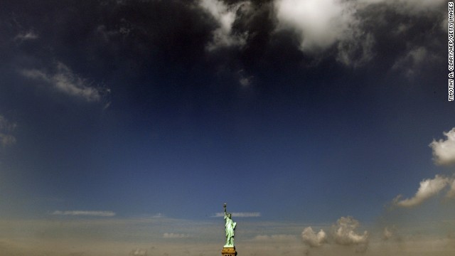 Clouds roll in over the Statue of Liberty in 2008.