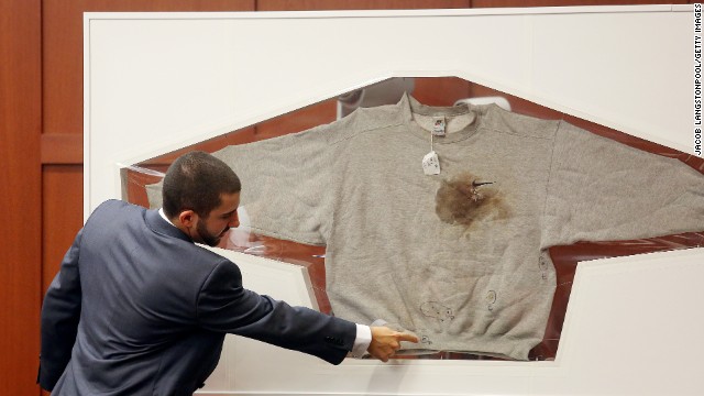 Florida Department of Law Enforcement Crime Lab Analyst Anthony Gorgone testifies about DNA findings on Wednesday, July 3, in Sanford, Florida. Here, Gorgone points to a sweatshirt worn by Trayvon Martin on the night Martin was shot. Only one stain on Martin's hooded jacket yielded a partial DNA profile that matched Zimmerman's.