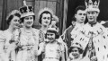 The royal family on the balcony at Buckingham Palace September 12, 1937 after the coronation of King George VI. King George VI (R) stands with Princess Elizabeth (C) and Princess Margaret.