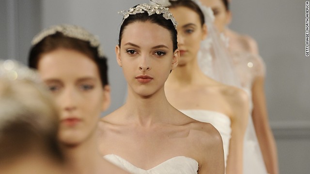 A model walks the runway during the Monique Lhuillier Bride 2014 Bridal Spring/Summer collection show on April 20, 2013 in New York City.