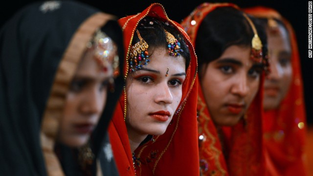 Pakistani brides attend a mass marriage ceremony in Karachi late March 26, 2013. Some 110 couples participated in the mass wedding ceremony organised by a local charity welfare trust Al Ghousia.