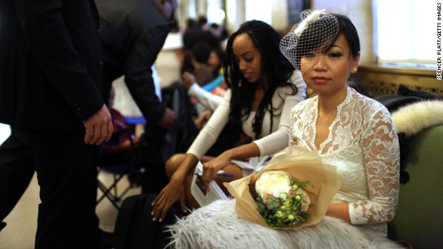 Bride Lini Sasanto waits to fill out marriage papers at a busy City Clerk's office on December 12, 2012 in New York City.