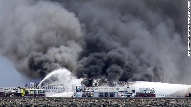 Fire crews attempt to quench the blaze after an Asiana Airlines Boeing 777 crashed on landing at San Francisco International Airport on Saturday, July 6.