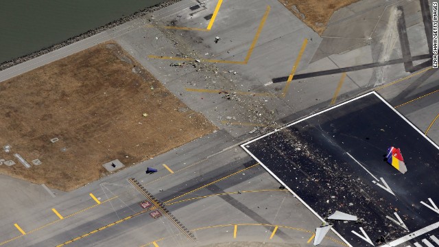 Debris litters the runway on July 6.