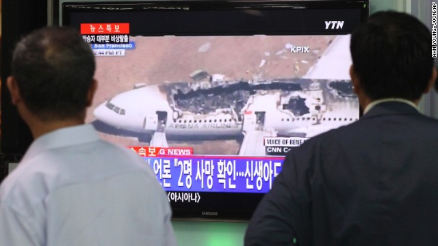 People in Seoul watch a news program reporting about the crash landing on July 6 in San Francisco. Asiana Airlines Flight 214 took off from Seoul earlier Saturday.