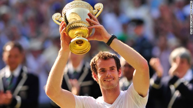 Andy Murray lifts the Wimbledon trophy to become the first British man to win the title since Fred Perry in 1936 following a straight sets win over Novak Djokovic.