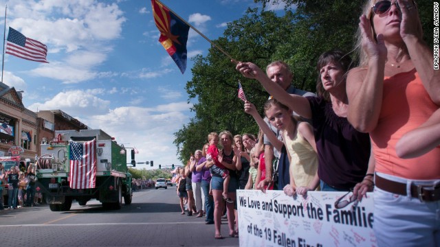 Citizens of Prescott, Arizona, welcome home the bodies of the 19 firefighters on Sunday, June 7. 