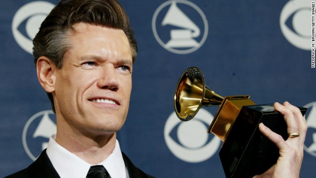 Randy Travis poses backstage at the 46th Annual Grammy Awards in Los Angeles.