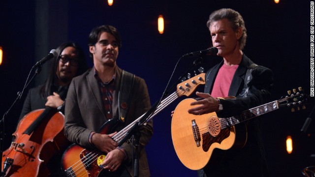 Travis performs with the Avett Brothers during a taping of "CMT Crossroads" in Franklin, Tennessee, on October 24, 2012.