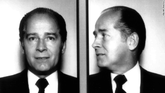 James "Whitey" Bulger, the reputed former head of Boston's Winter Hill Gang, evaded police for 16 years before being arrested with girlfriend Catherine Greig in Santa Monica, California, in 2011. Seen here in a 1984 FBI photo, he is facing trial for racketeering, extortion and 19 counts of murder.