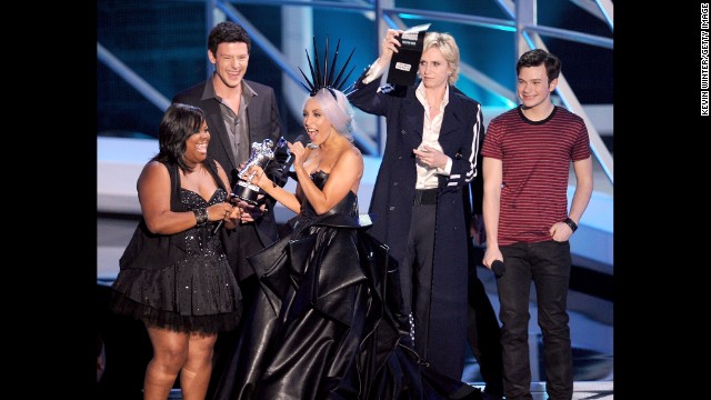 Lady Gaga, center, accepts the Best Pop Video award from actors Amber Riley, Cory Monteith, Jane Lynch and Chris Colfer at the 2010 MTV Video Music Awards. 