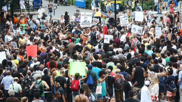 People gather at a rally honoring Trayvon Martin at Union Square in New York on July 14.