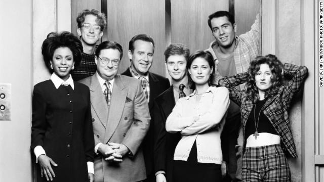 The "NewsRadio" cast, (from left), Khandi Alexander, Andy Dick, Stephen Root, Phil Hartman, Dave Foley, Maura Tierney, Joe Rogan and Vicki Lewis were pretty tight prior to Hartman's death. Hartman, who was shot to death by his wife in 1998, was revealed to have died of a heart attack at the beginning of the fifth season, and Hartman was replaced by actor Jon Lovitz.