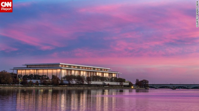 The <a href='http://ireport.cnn.com/docs/DOC-940723'>Kennedy Center for Performing Arts</a> glows as the sun sets over the Potomac River. 