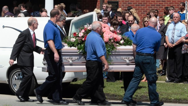 Pallbearers carry a casket of one of Michael McLendon's 10 victims. McLendon shot and killed his mother in her Kingston, Alabama, home, before shooting his aunt, uncle, grandparents and five more people. He shot and killed himself in Samson, Alabama, on March 10, 2009. McClendon left a note saying he put his mother "out of her misery."