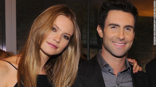 Model Behati Prinsloo is now married to the "Sexiest Man Alive," Adam Levine. Here's a look at the "sexy" singer through the years: