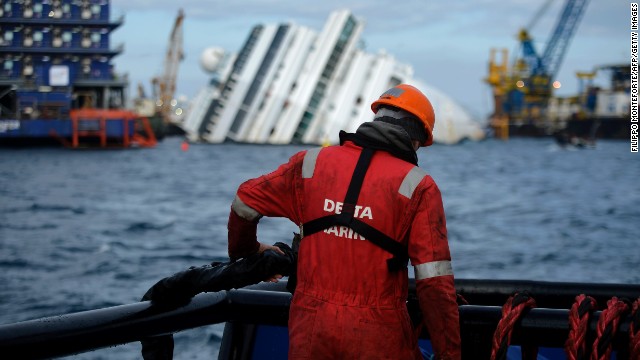 A man works in front of the shipwreck on January 12, 2013.