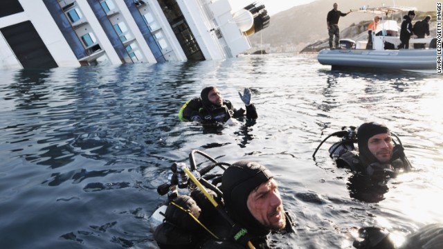 Members of the Italian coast guard conduct a search-and-rescue mission on January 21, 2012.
