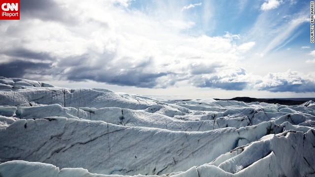 While hiking on the glacier Svínafellsjokull in South Iceland, <a href='http://ireport.cnn.com/docs/DOC-985034'>iReporter Erin Ramos</a> captured this brilliant view of sunlight piercing through the clouds overhead and reflecting off the ice. "There was a beautiful contrast between the highlights and shadows. I couldn't have asked for better weather," Ramos said.