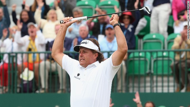 It's a dramatic final day at Muirfield. Another birdie on the 18th puts Phil Mickelson in the driving seat to win his first British Open title.